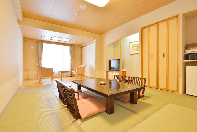 Imagen de la habitación del Hotel Higashikawa Asahidake Onsen Bear Monte. Foto 7