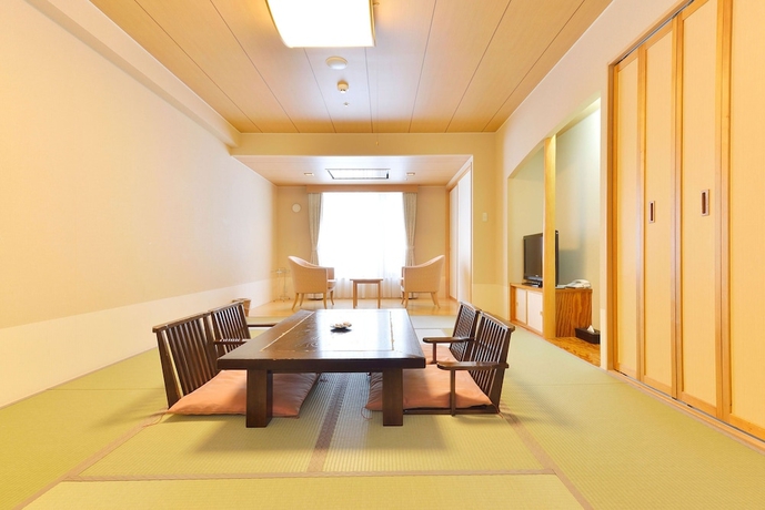 Imagen de la habitación del Hotel Higashikawa Asahidake Onsen Bear Monte. Foto 8