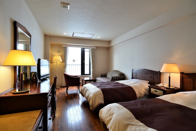 Imagen de la habitación del Hotel Higashikawa Asahidake Onsen Bear Monte. Foto 9