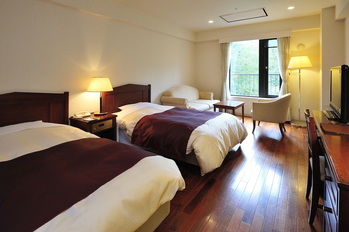 Imagen de la habitación del Hotel Higashikawa Asahidake Onsen Bear Monte. Foto 10