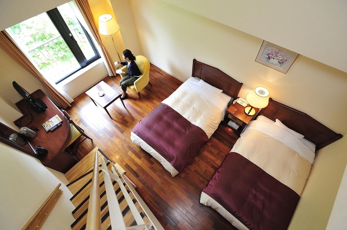 Imagen de la habitación del Hotel Higashikawa Asahidake Onsen Bear Monte. Foto 11