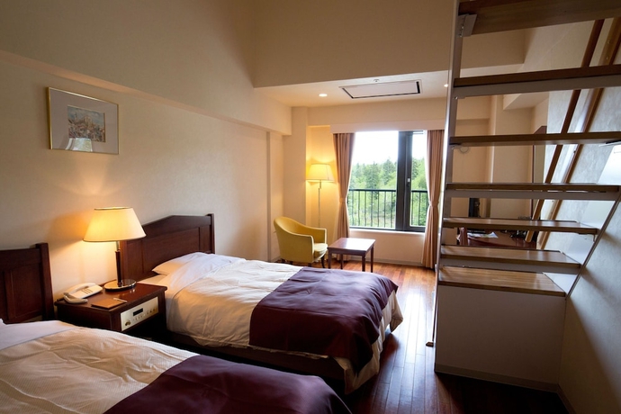 Imagen de la habitación del Hotel Higashikawa Asahidake Onsen Bear Monte. Foto 12