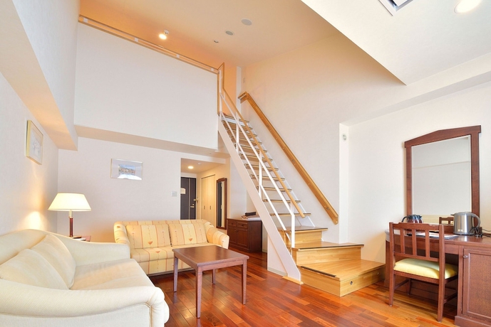 Imagen de la habitación del Hotel Higashikawa Asahidake Onsen Bear Monte. Foto 13