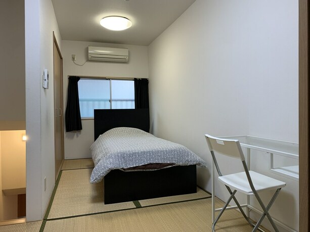 Imagen de la habitación del Hotel Higashimikuni House. Foto 25