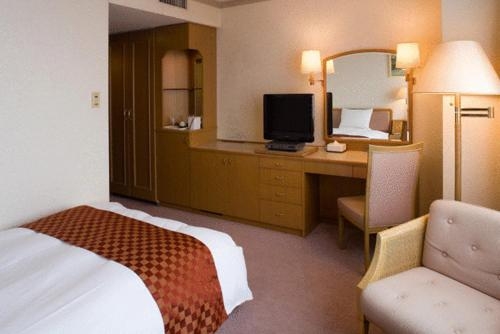Imagen de la habitación del Hotel Higashinihon Utsunomiya. Foto 8