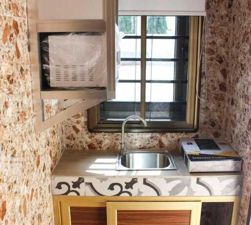 Imagen de la habitación del Hotel High Level Apartment. Foto 11