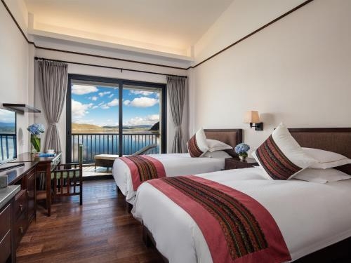 Imagen de la habitación del Hotel High Mountain Resort Shangri-la. Foto 6