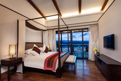 Imagen de la habitación del Hotel High Mountain Resort Shangri-la. Foto 8