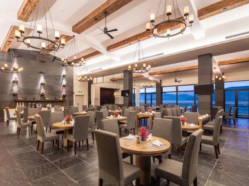 Imagen del bar/restaurante del Hotel High Mountain Resort Shangri-la. Foto 4