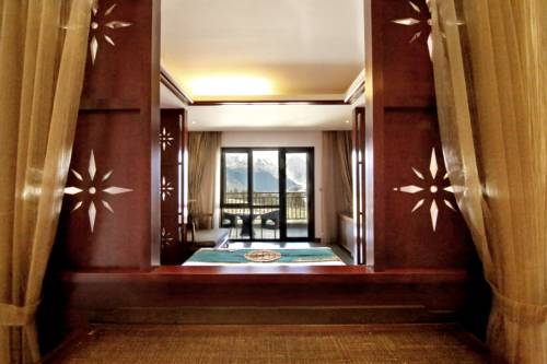 Imagen de la habitación del Hotel High Mountain Resort-deqin. Foto 4