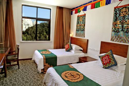 Imagen de la habitación del Hotel High Mountain Resort-deqin. Foto 6