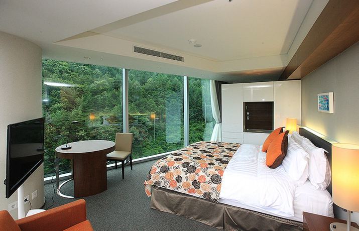 Imagen de la habitación del Hotel High1 Grand Convention Tower. Foto 8