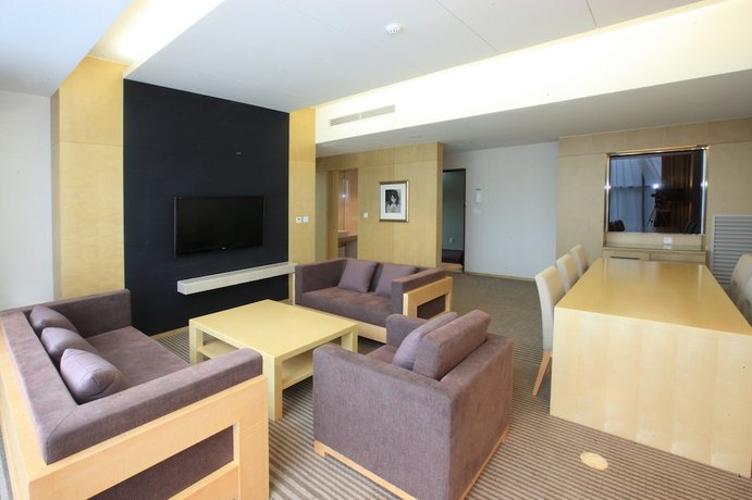 Imagen de la habitación del Hotel High1 Grand Convention Tower. Foto 13