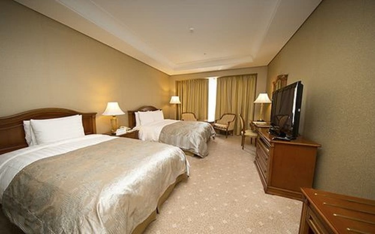 Imagen de la habitación del Hotel High1 Grand Main Tower. Foto 3