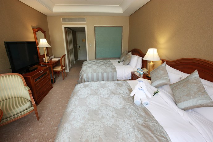 Imagen de la habitación del Hotel High1 Grand Main Tower. Foto 8