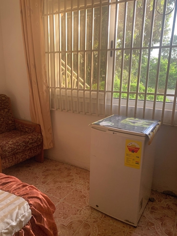 Imagen de la habitación del Hotel HighLander Guest House. Foto 7