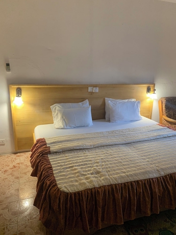 Imagen de la habitación del Hotel HighLander Guest House. Foto 8