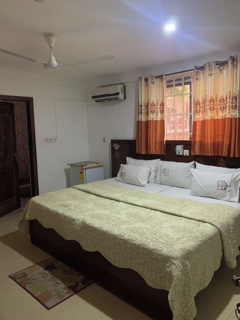 Imagen de la habitación del Hotel HighLander Guest House. Foto 9