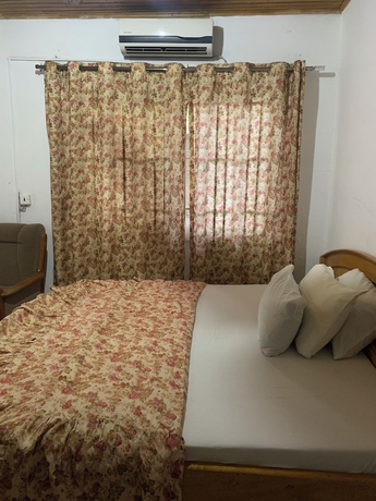 Imagen de la habitación del Hotel HighLander Guest House. Foto 11