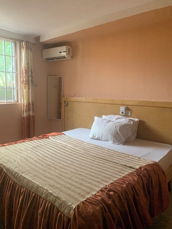 Imagen de la habitación del Hotel HighLander Guest House. Foto 13