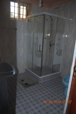 Imagen de la habitación del Hotel HighLander Guest House. Foto 16