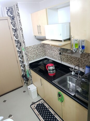Imagen de la habitación del Hotel High-Tech Studio at Grass Residences. Foto 24