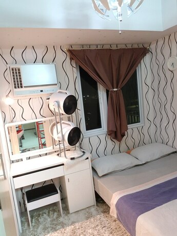 Imagen de la habitación del Hotel High-Tech Studio at Grass Residences. Foto 26