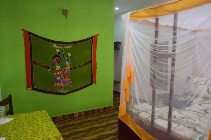 Imagen de la habitación del Hotel Highland Bungalows. Foto 12