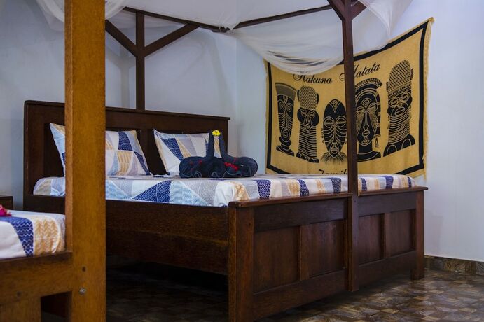 Imagen de la habitación del Hotel Highland Bungalows. Foto 14