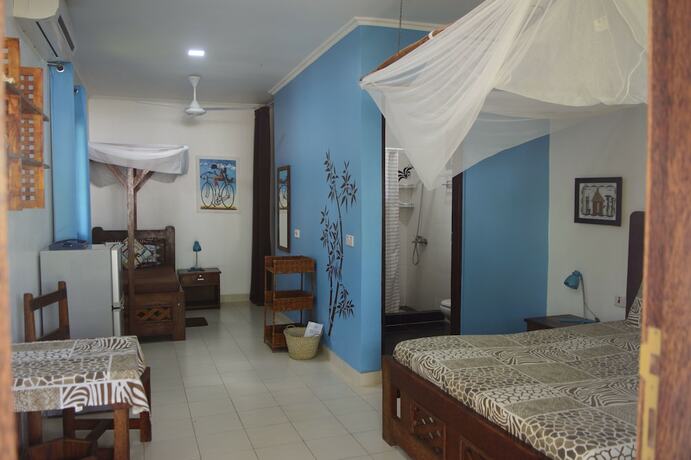Imagen de la habitación del Hotel Highland Bungalows. Foto 15