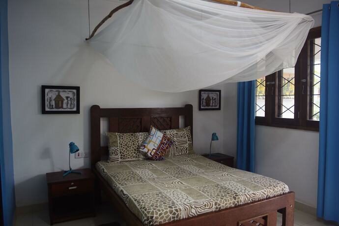 Imagen de la habitación del Hotel Highland Bungalows. Foto 17