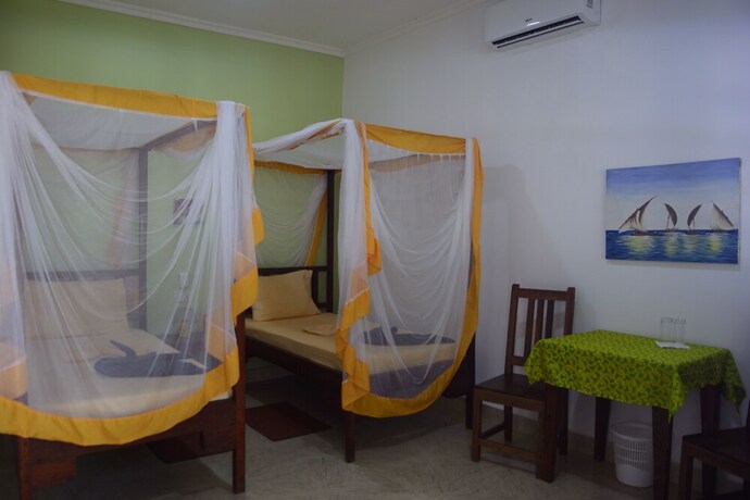 Imagen de la habitación del Hotel Highland Bungalows. Foto 20