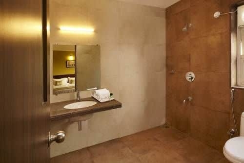 Imagen de la habitación del Hotel Highland Homes Budget. Foto 7