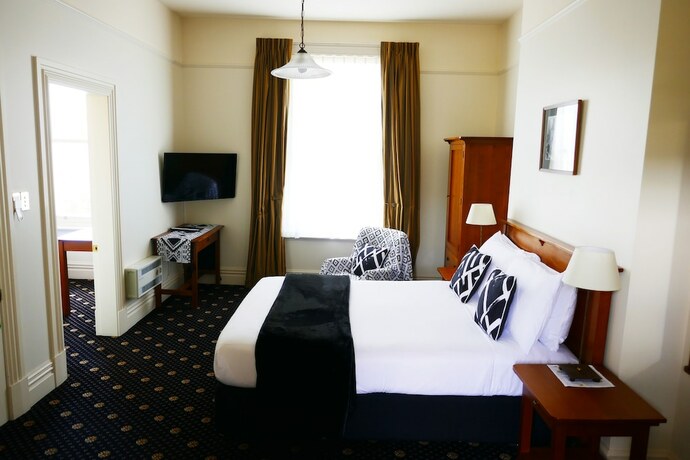 Imagen de la habitación del Hotel Highland House Boutique. Foto 11