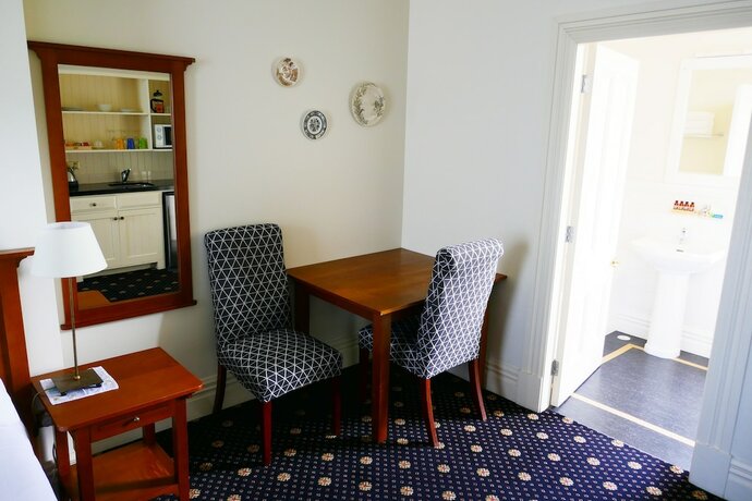 Imagen de la habitación del Hotel Highland House Boutique. Foto 21