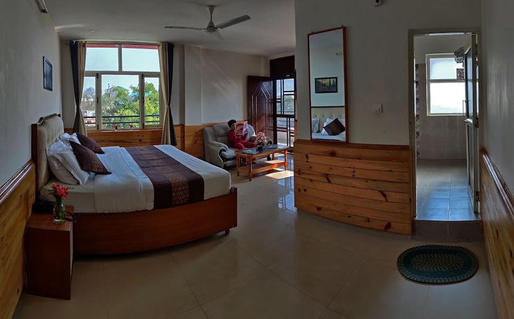 Imagen de la habitación del Hotel Highland Village Resort. Foto 2