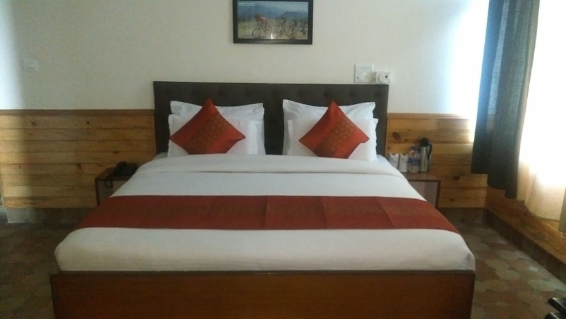 Imagen de la habitación del Hotel Highland Village Resort. Foto 5