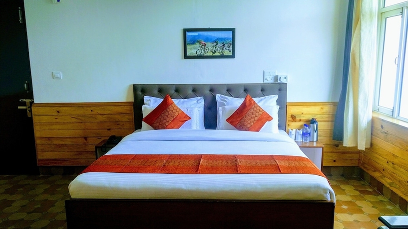 Imagen de la habitación del Hotel Highland Village Resort. Foto 8
