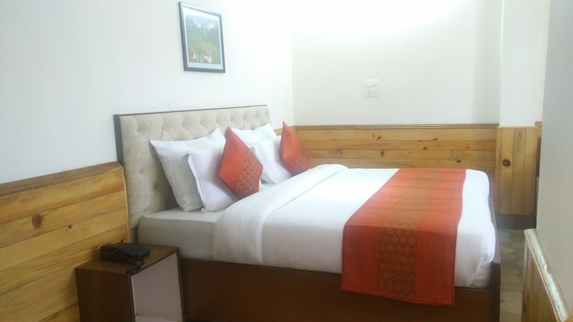Imagen de la habitación del Hotel Highland Village Resort. Foto 9