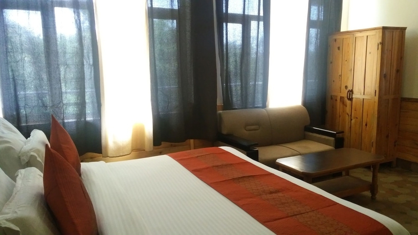 Imagen de la habitación del Hotel Highland Village Resort. Foto 10