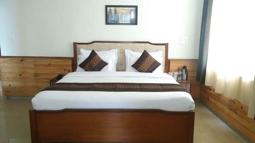 Imagen de la habitación del Hotel Highland Village Resort. Foto 11