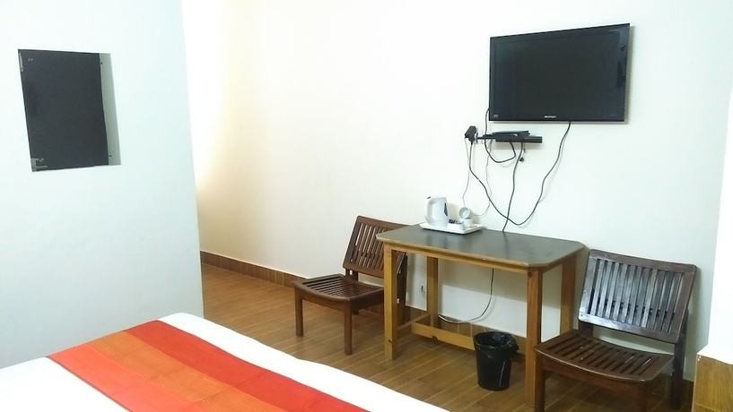 Imagen de la habitación del Hotel Highland Village Resort. Foto 15