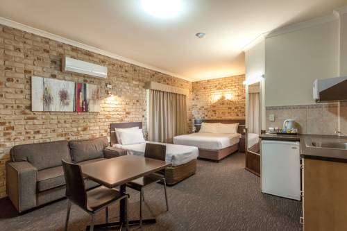 Imagen de la habitación del Hotel Highlander Motor Inn. Foto 3