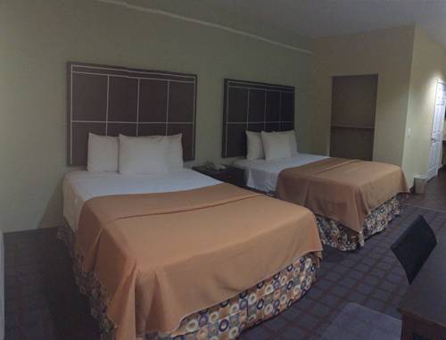 Imagen de la habitación del Hotel Highlands Suites. Foto 6