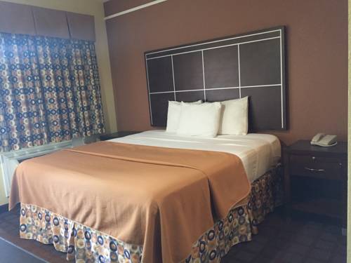 Imagen de la habitación del Hotel Highlands Suites. Foto 9