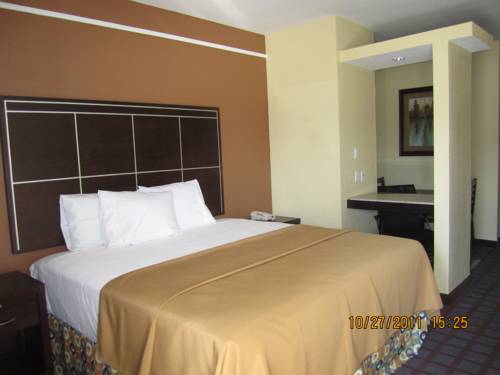 Imagen de la habitación del Hotel Highlands Suites. Foto 11