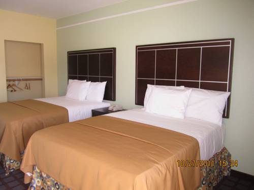 Imagen de la habitación del Hotel Highlands Suites. Foto 12