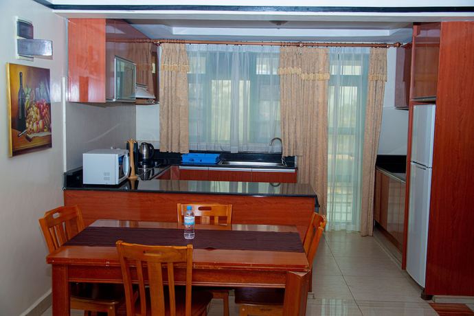 Imagen de la habitación del Hotel Highlands Suites, Kigali. Foto 7