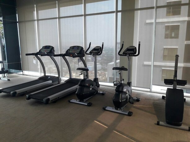 Imagen general del Hotel Highrise Cityview Aspire Condo Gym Pool. Foto 14