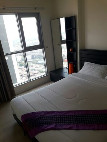 Imagen de la habitación del Hotel Highrise Cityview Aspire Condo Gym Pool. Foto 19